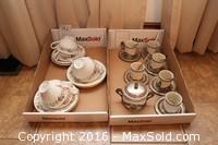 Cups And Saucers And Coffee Set A