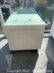 MaxSold Auction: White Set of two rolling tables - West Vancouver (British Columbia, Canada) SELLER MANAGED Downsizing Online Auction - Duchess Avenue