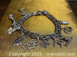 MaxSold Auction: Sterling Silver &#39;Dynasty&#39; Charm Bracelet &#38; 10 Charms - Toronto (Ontario, Canada) SELLER MANAGED Estate Sale Online Auction - Roxton Road