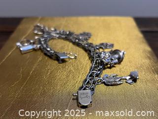 MaxSold Auction: Sterling Silver &#39;Dynasty&#39; Charm Bracelet &#38; 10 Charms - Toronto (Ontario, Canada) SELLER MANAGED Estate Sale Online Auction - Roxton Road