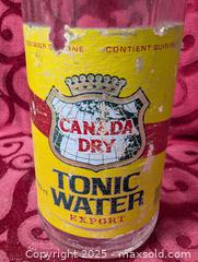 MaxSold Auction: large vintage Soda bottel yellow lable  - Inverary (Ontario, Canada) SELLER MANAGED Moving Online Auction - Battersea Road