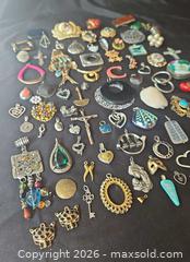 MaxSold Auction: Assortment of Pendants and Charms - Kingston (Ontario, Canada) SELLER MANAGED Downsizing Online Auction - Glenview Avenue