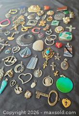 MaxSold Auction: Assortment of Pendants and Charms - Kingston (Ontario, Canada) SELLER MANAGED Downsizing Online Auction - Glenview Avenue