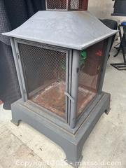 MaxSold Auction: Black Steel Outdoor Fire Pit with Mesh Spark Screen - Kingston (Ontario, Canada) SELLER MANAGED Downsizing Online Auction - Glenview Avenue