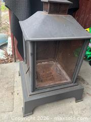 MaxSold Auction: Black Steel Outdoor Fire Pit with Mesh Spark Screen - Kingston (Ontario, Canada) SELLER MANAGED Downsizing Online Auction - Glenview Avenue
