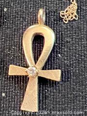 MaxSold Auction: 14K Yellow Gold Ankh Pendant Necklace with Filigree and Stone - Ashland (Massachusetts, USA) PARTNER MANAGED Downsizing Online Auction - Old Connecticut Path