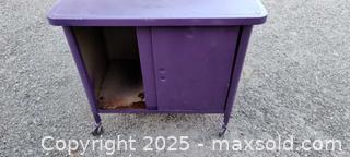 MaxSold Auction: 24-inch Purple Painted Metal Storage cabinet  - Gananoque (Ontario, Canada) SELLER MANAGED Downsizing Online Auction -  Highway 2 West(STORAGE)                      
