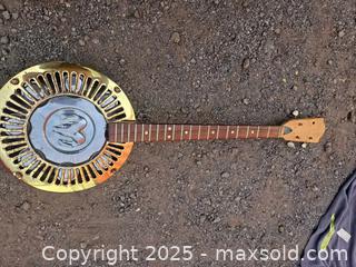 MaxSold Auction: Art Deco Guitar with Brass/Gold-Tone Coverplate, Chrome Hub - Gananoque (Ontario, Canada) SELLER MANAGED Downsizing Online Auction -  Highway 2 West(STORAGE)                      