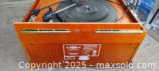MaxSold Auction: Crosley Portable Turntable in Wood-Grain Case - Gananoque (Ontario, Canada) SELLER MANAGED Downsizing Online Auction -  Highway 2 West(STORAGE)                      