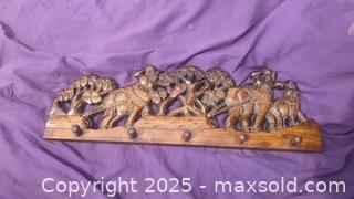 MaxSold Auction: Hand-Carved Wooden Wall Rack with 5 Peg Hooks, Elephant Motif - Gananoque (Ontario, Canada) SELLER MANAGED Downsizing Online Auction -  Highway 2 West(STORAGE)                      