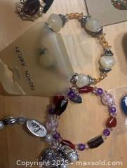 MaxSold Auction: Mixed Costume Jewelry Lot: Bracelets, Earrings, Lapel Pin - Gananoque (Ontario, Canada) SELLER MANAGED Downsizing Online Auction -  Highway 2 West(STORAGE)                      