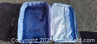 MaxSold Auction: ORMI Dark Blue Soft-Sided Checked Suitcase, 29 in - Gananoque (Ontario, Canada) SELLER MANAGED Downsizing Online Auction -  Highway 2 West(STORAGE)                      
