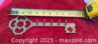 MaxSold Auction: Ornate Brass Wall-Mounted Key Rack, 5 Hooks, ~11 in - Gananoque (Ontario, Canada) SELLER MANAGED Downsizing Online Auction -  Highway 2 West(STORAGE)                      