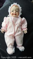 MaxSold Auction: Porcelain Baby Doll - Pink Outfit & Bonnet, Unknown Brand - Gananoque (Ontario, Canada) SELLER MANAGED Downsizing Online Auction -  Highway 2 West(STORAGE)                      