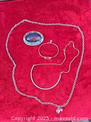 MaxSold Auction: Silver-Tone Belt Buckle, Bracelet & 2 Necklaces - Gananoque (Ontario, Canada) SELLER MANAGED Downsizing Online Auction -  Highway 2 West(STORAGE)                      