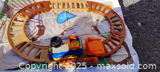MaxSold Auction: Toy Train Playset with Track and Cargo Car - Gananoque (Ontario, Canada) SELLER MANAGED Downsizing Online Auction -  Highway 2 West(STORAGE)                      