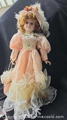 MaxSold Auction: Victorian-Style Porcelain Collectible Doll with Parasol, 16 in - Gananoque (Ontario, Canada) SELLER MANAGED Downsizing Online Auction -  Highway 2 West(STORAGE)                      