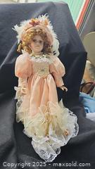MaxSold Auction: Victorian-Style Porcelain Collectible Doll with Parasol, 16 in - Gananoque (Ontario, Canada) SELLER MANAGED Downsizing Online Auction -  Highway 2 West(STORAGE)                      