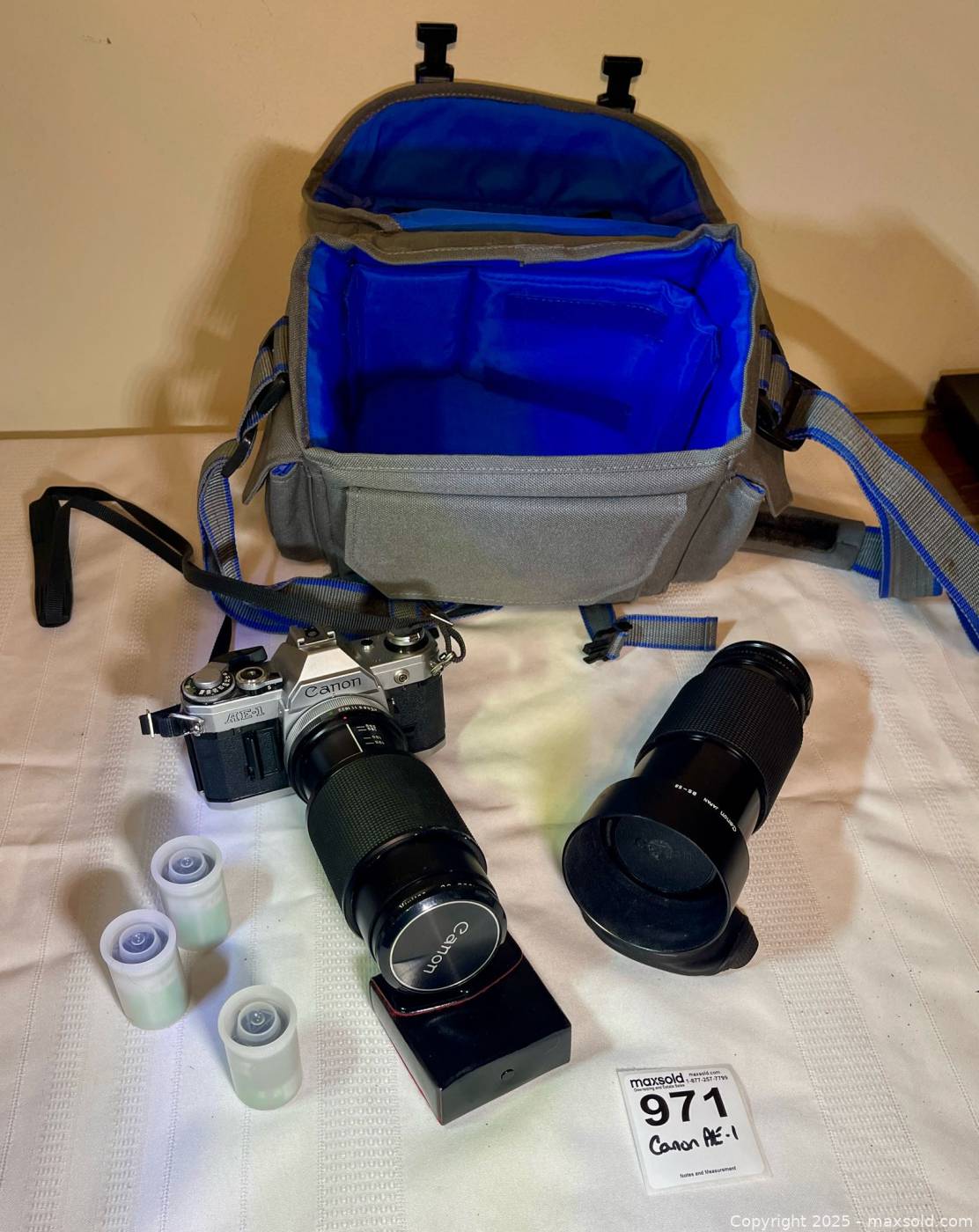 Canon AE-1 camera with FD 70-210mm lens | Maxsold