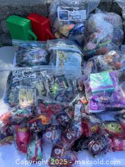 MaxSold Auction: 4 Boxes of McDonald's Happy Meal Toys  - Los Gatos (California, USA) PARTNER MANAGED Estate Sale Online Auction - Francis Oaks Way