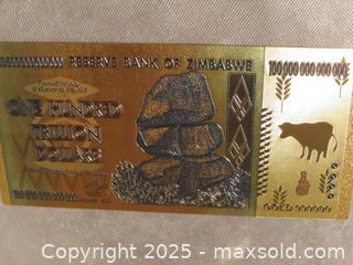 MaxSold Auction: **Zimbabwe One Hundred Trillion Dollars Gold Foil Banknotes** - Colorado Springs (Colorado, USA) SELLER MANAGED Estate Sale Online Auction - Mcnichols Court (CONDO)                  