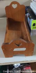 MaxSold Auction: Decorative Wooden Doll Cradle with Heart Cutout - Plainville (Massachusetts, USA) SELLER MANAGED Downsizing Online Auction -  West Bacon Street