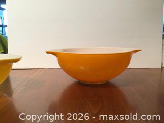 MaxSold Auction: Vintage - Pyrex “Daisy” Cinderella mixing bowls, orange & yellow 1968.  (set of 4) - Kawartha Lakes (Ontario, Canada) SELLER MANAGED Estate Sale Online Auction - Evergreen Street