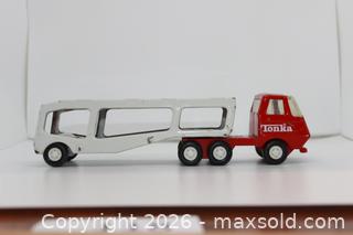 MaxSold Auction: Vintage 1970's Mini Tonka Toy Car Hauler Red Truck White Trailer  - Kawartha Lakes (Ontario, Canada) SELLER MANAGED Estate Sale Online Auction - Evergreen Street