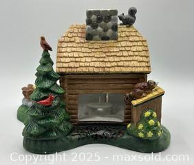 MaxSold Auction: Gone Fishing Log Cabin Candle Holder Decor (with 2 candles) by PartyLite  - Toronto (Ontario, Canada) SELLER MANAGED Downsizing Online Auction - Logan Avenue