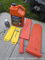 MaxSold Auction: Husqvarna Chainsaw, carrying case, oil, accessories - Brand New - Orillia (Ontario, Canada) SELLER MANAGED Downsizing Online Auction - Harvie Settlement Road (STORAGE)