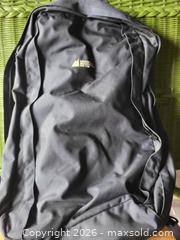 MaxSold Auction: MEC Daypack / Travel Backpack Charcoal & Navy with Rainbow Strap and accessories - Orillia (Ontario, Canada) SELLER MANAGED Downsizing Online Auction - Harvie Settlement Road (STORAGE)