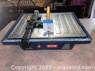 MaxSold Auction: Wet Tile Saw and Metal Table - Quinte West (Ontario, Canada) SELLER MANAGED Downsizing Online Auction - Teal Road
