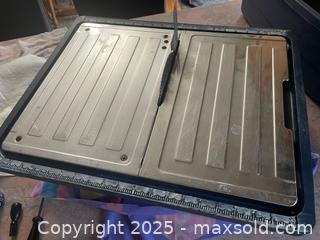 MaxSold Auction: Wet Tile Saw and Metal Table - Quinte West (Ontario, Canada) SELLER MANAGED Downsizing Online Auction - Teal Road