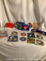 MaxSold Auction: DVD advertising Lot - Hamilton (Ontario, Canada) SELLER MANAGED Downsizing Online Auction -  Sidney Crescent