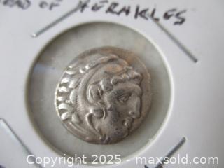 MaxSold Auction: Alexander The Great 306-323 BC. Head Of Heracles Wearing Lion Head-Dress. Silver Drachm Currency Coin. - Toronto (Ontario, Canada) SELLER MANAGED Reseller Online Auction - Annette Street