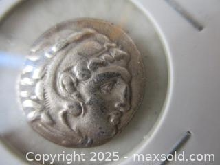 MaxSold Auction: Alexander The Great 306-323 BC. Head Of Heracles Wearing Lion Head-Dress. Silver Drachm Currency Coin. - Toronto (Ontario, Canada) SELLER MANAGED Reseller Online Auction - Annette Street