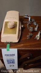 MaxSold Auction: Singer Sewing Machine Attachments Lot: Buttonholer + Presser Feet - Loyalist (Ontario, Canada) SELLER MANAGED Downsizing Online Auction - Main Street