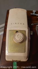 MaxSold Auction: Singer Sewing Machine Attachments Lot: Buttonholer + Presser Feet - Loyalist (Ontario, Canada) SELLER MANAGED Downsizing Online Auction - Main Street