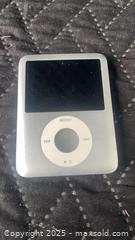 MaxSold Auction: Apple iPod (classic/nano style) 4GB Silver with Click Wheel - Ottawa (Ontario, Canada) SELLER MANAGED Moving Online Auction - Hawthorne Road
