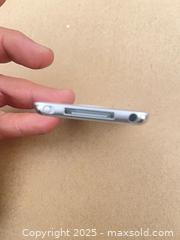 MaxSold Auction: Apple iPod (classic/nano style) 4GB Silver with Click Wheel - Ottawa (Ontario, Canada) SELLER MANAGED Moving Online Auction - Hawthorne Road