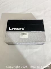 MaxSold Auction: Linksys (Cisco-era) vintage network device — router/voice gateway/ATA - Toronto (Ontario, Canada) SELLER MANAGED Reseller Online Auction -  York Mills Road