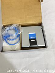 MaxSold Auction: Linksys (Cisco-era) vintage network device — router/voice gateway/ATA - Toronto (Ontario, Canada) SELLER MANAGED Reseller Online Auction -  York Mills Road