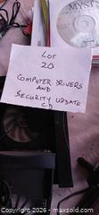 MaxSold Auction: Lots of Various Used Computer CD Drivers, Wires, Software and Security Update CD - Capitol Heights (Maryland, USA) SELLER MANAGED Downsizing Online Auction - Quo Avenue