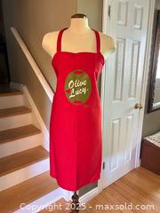 MaxSold Auction: 1998 Wearable Vegetables “Olive Lucy” Parody Apron – Red - London (Ontario, Canada) PARTNER MANAGED Downsizing Online Auction - Trillium Crescent