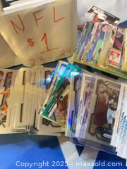MaxSold Auction: NFL 90’s 23-24 Boxes All Base Parallels  - Toronto (Ontario, Canada) SELLER MANAGED Reseller Online Auction -  Bayview Avenue