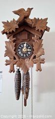 MaxSold Auction: Black Forest Style Cuckoo Wall Clock with Pinecone Weights B - Ottawa (Ontario, Canada) PARTNER MANAGED Downsizing Online Auction - Flower Avenue