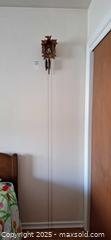 MaxSold Auction: Black Forest Style Cuckoo Wall Clock with Pinecone Weights B - Ottawa (Ontario, Canada) PARTNER MANAGED Downsizing Online Auction - Flower Avenue
