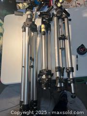 MaxSold Auction: Camera Tripods - Walpole (Massachusetts, USA) SELLER MANAGED Downsizing Online Auction - Park Lane