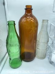 MaxSold Auction: Lot of 6 Glass Trays, Vases & Bottles — Clear, Amber, Green - Smiths Falls (Ontario, Canada) SELLER MANAGED Reseller Online Auction -  Autumn Drive