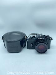 MaxSold Auction: Nikon EM 35mm SLR (Film) with 50mm f/1.8 - Smiths Falls (Ontario, Canada) SELLER MANAGED Reseller Online Auction -  Autumn Drive